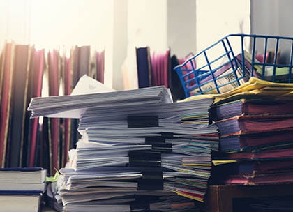 Stack of papers in in-tray
